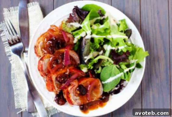 Sliced Maple Bacon-Wrapped Pork Tenderloin with Rosemary Cherry Sauce