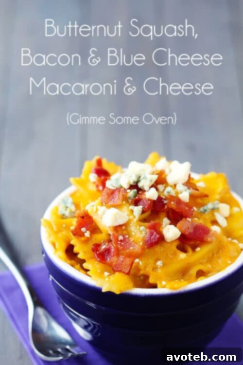 Close-up of creamy Butternut Squash, Bacon & Blue Cheese Macaroni and Cheese garnished with fresh ingredients
