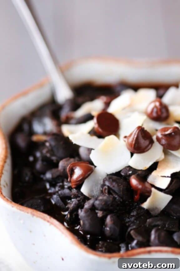 Hearty Black Bean Chili with Chocolate and Coconut served in a bowl