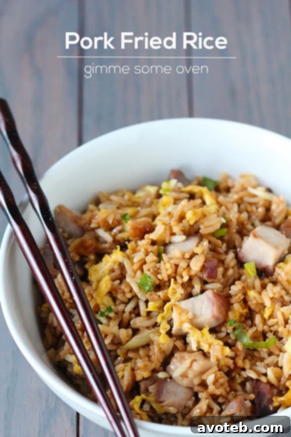 Overhead view of ingredients for Pork Fried Rice, including fresh vegetables and cooked pork.