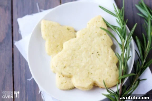 Lemon Rosemary Shortbread Cookies | gimmesomeoven.com Lemon Rosemary Shortbread Cookies on a cooling rack