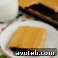 Closeup of chocolate peanut butter sheet cake slice