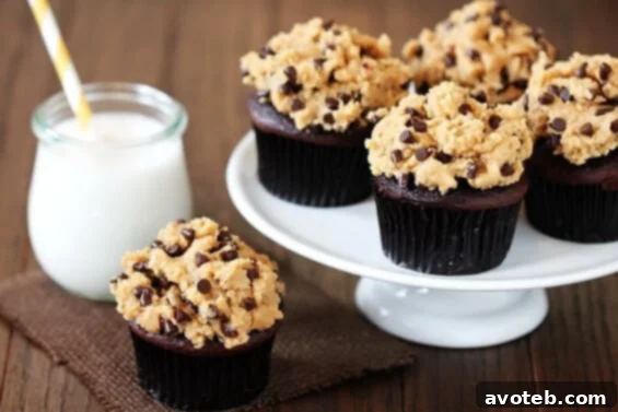 Decadent Chocolate Cupcakes generously topped with rich Peanut Butter Cookie Dough Frosting.