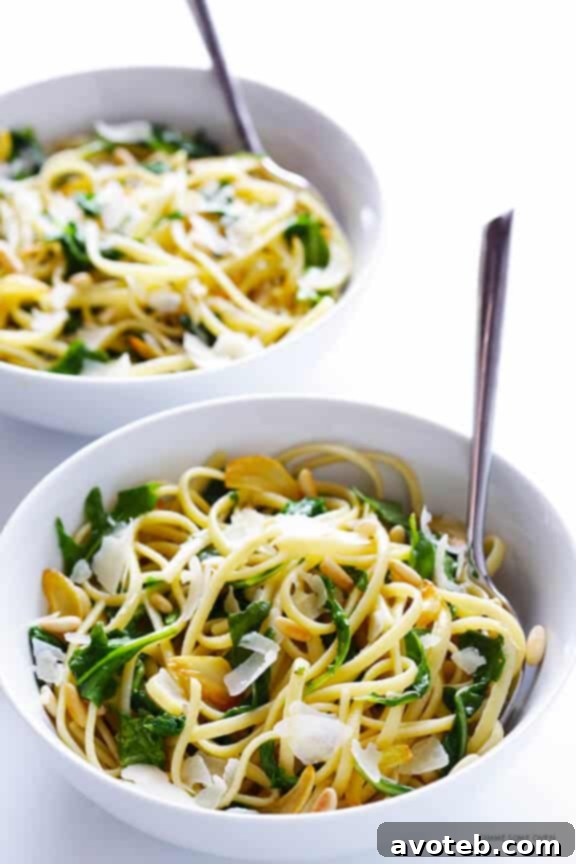 A perfectly portioned bowl of Linguine with Arugula, Garlic, and Parmesan ready for enjoyment