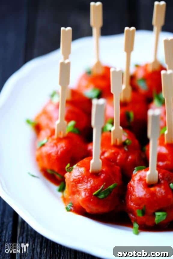 Easy Meatballs served with small forks on a platter