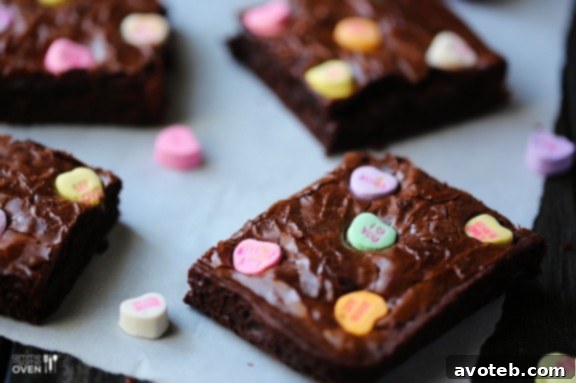Love Note Brownies 2 Rich, fudgy chocolate brownies topped with colorful conversation hearts for Valentine's Day