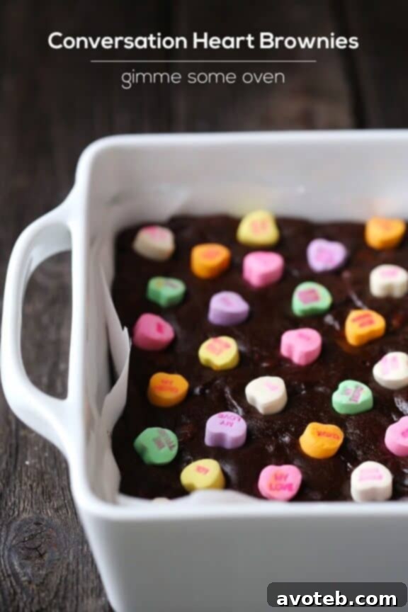 Love Note Brownies 5 Overhead view of a tray of freshly baked conversation heart brownies, cut into squares