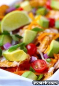 Stacked Loaded Cheesy Pretzel Nachos ready to serve