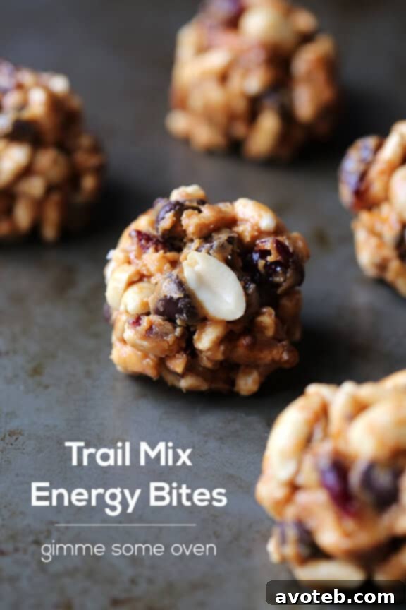 A Trail Mix Energy Bite with a bite taken out, revealing the texture.