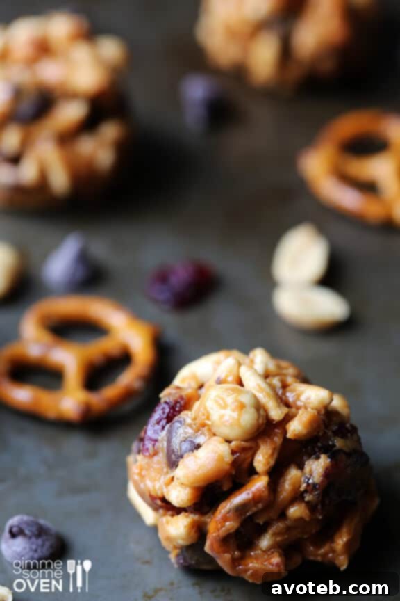 Mixing the ingredients for Trail Mix Energy Bites in a large bowl.