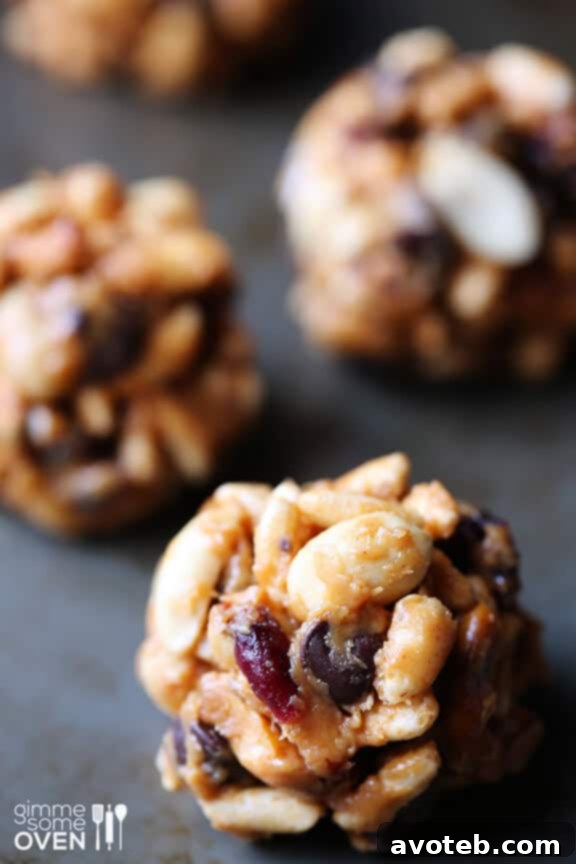 A plate full of freshly rolled Trail Mix Energy Bites.