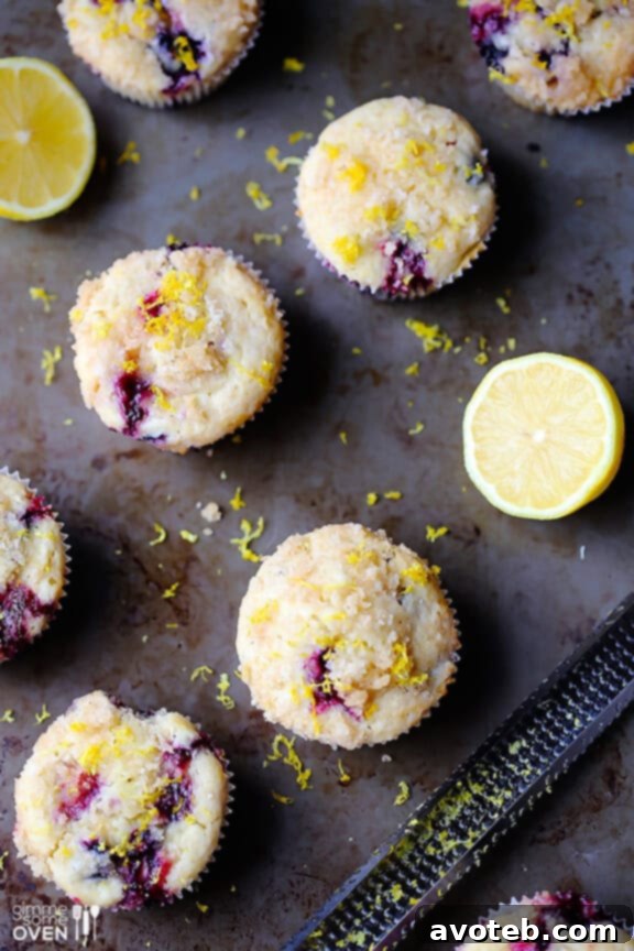 Muffin batter in liners with streusel topping before baking