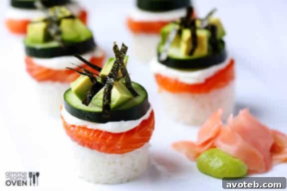 The Philadelphia Stack 3 Close-up of freshly prepared Philadelphia Sushi Stacks with vibrant ingredients