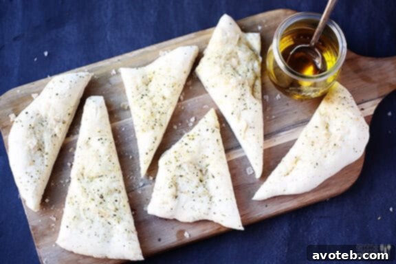 Another shot of the freshly baked Easy Italian Flatbread, glistening with olive oil and spices.