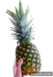 A freshly cut pineapple, ready to be enjoyed.