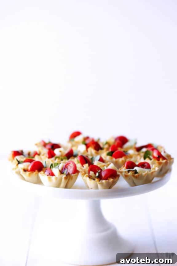 Close-up of Caprese Phyllo Cups with Balsamic Glaze