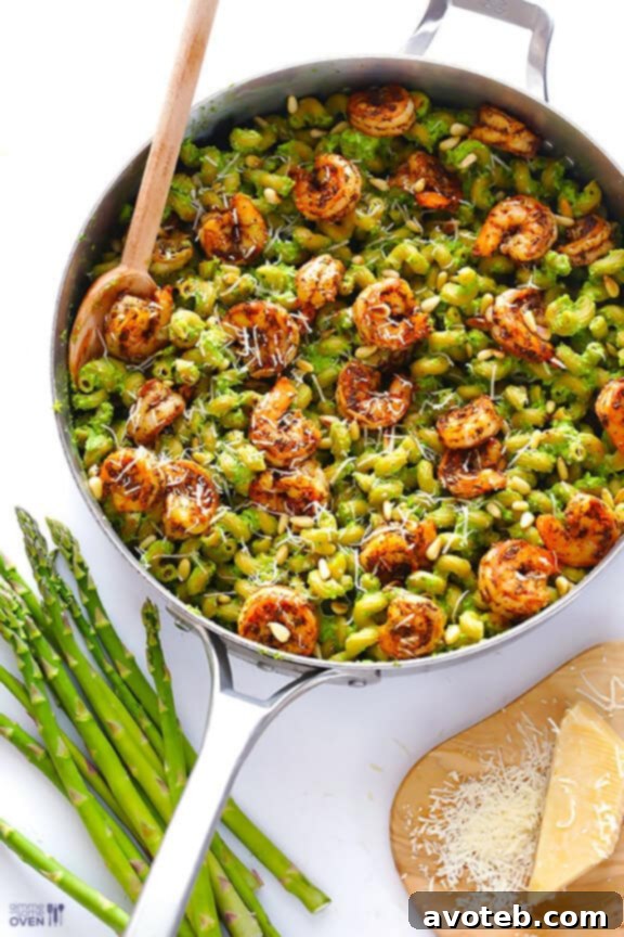 Pesto pasta with shrimp and pine nuts.
