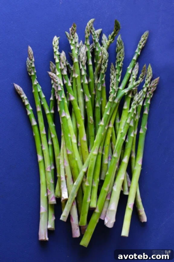 Fresh asparagus spears being prepared for pesto.