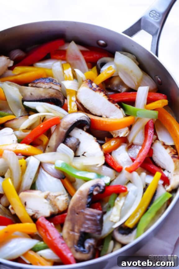Sizzling Margarita Chicken Fajitas – A Weekend Treat Close-up of Skillet Fajitas with Fresh Vegetables