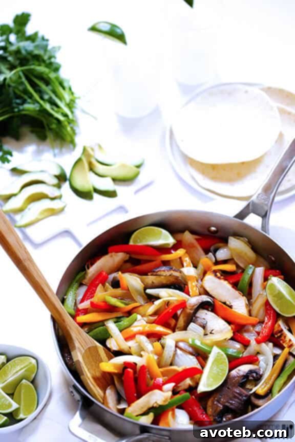 Cook Delicious Fajitas with the Calphalon AccuCore Pan Margarita Chicken Fajitas and a Calphalon Pan on a Kitchen Counter