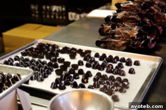 Elbow Chocolates: A Delicious Exploration 27 Chocolates being carefully hand-wrapped and packaged