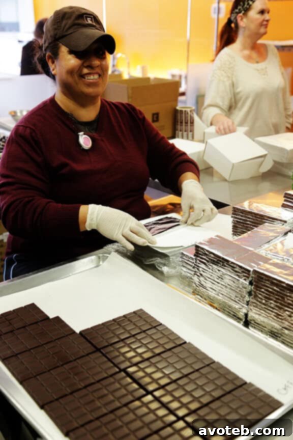 Elbow Chocolates: A Delicious Exploration 29 Friendly staff member at Christopher Elbow Chocolates