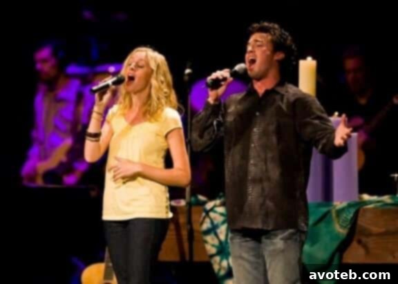 Author and Cameron singing 'The Prayer' at a church event, showcasing their musical bond.