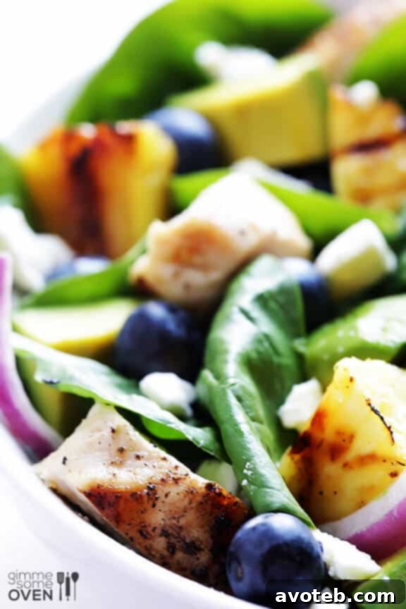 Grilled Pineapple, Chicken & Avocado Salad - A vibrant summer meal.