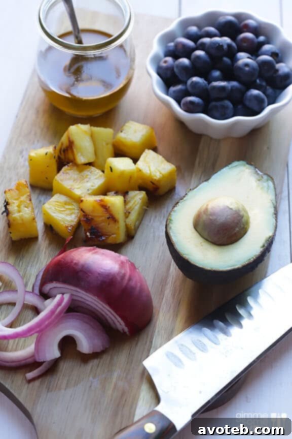 A close-up of the Grilled Pineapple, Chicken & Avocado Salad.