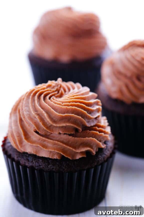 Cupcake being cored and filled with Nutella