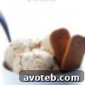 Biscoff Ice Cream in a bowl with a spoon, ready to eat.
