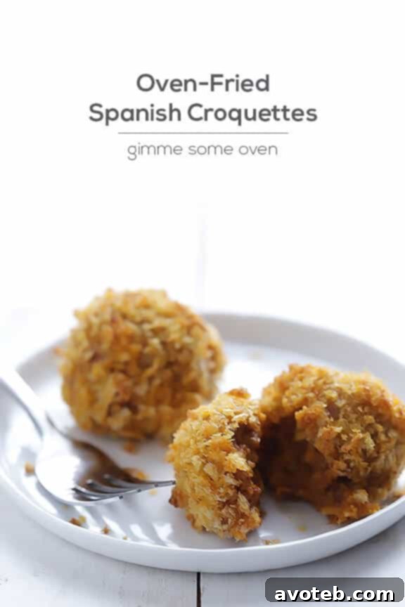 A plate of golden brown Oven-Fried Spanish Croquettes ready to be served