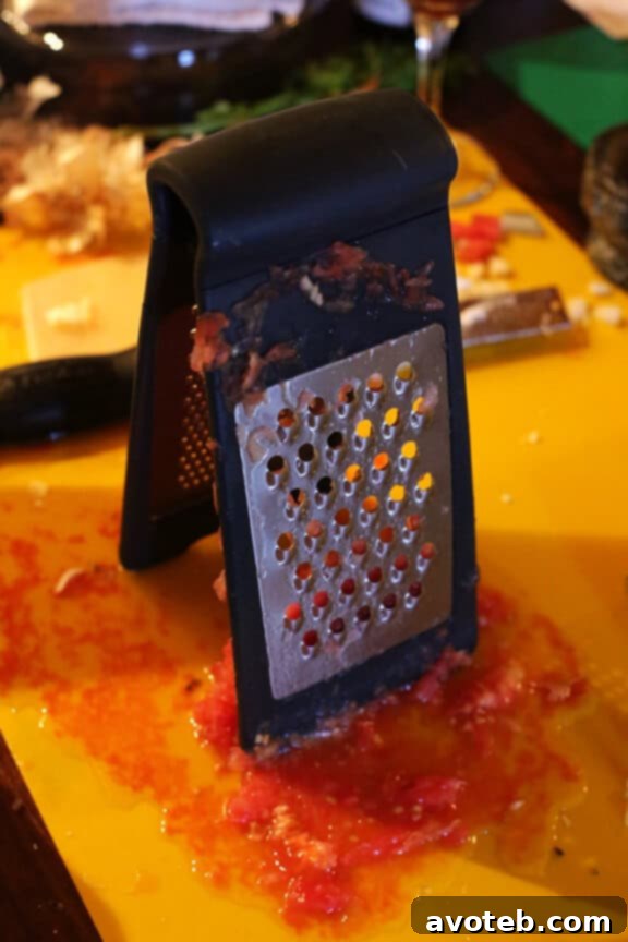 Grating fresh tomatoes, a unique technique for Spanish sauces