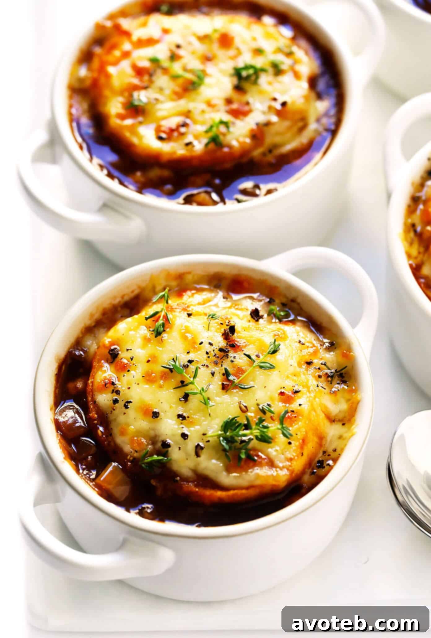 Gourmet French Onion Soup with Fresh Thyme Garnish