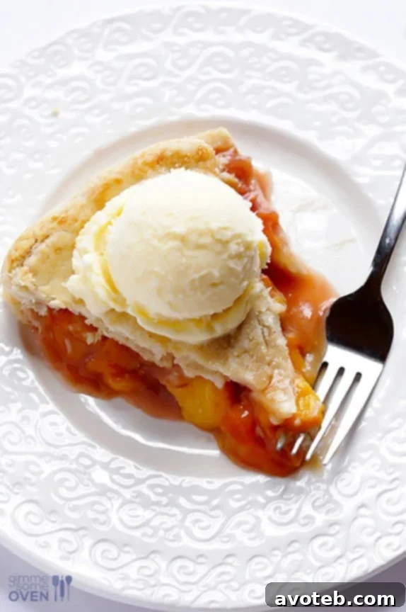Close-up of the golden-brown top crust of Peach Bourbon Pie