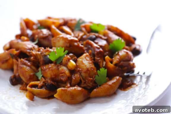 Individual serving of Chicken Enchilada Pasta Bake in a bowl