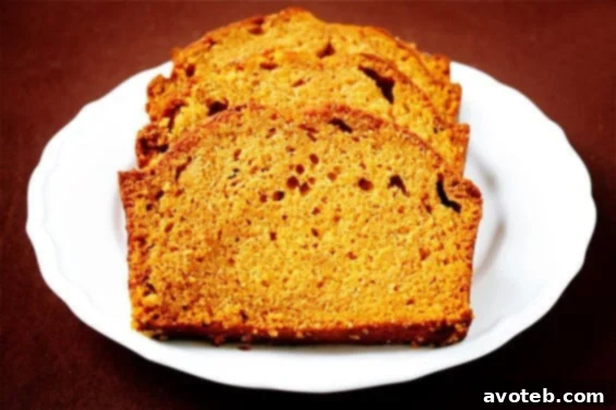 Sliced classic pumpkin bread revealing moist interior