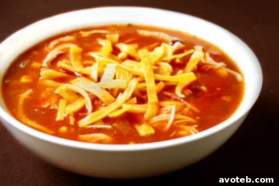 Delicious Slow Cooker Chicken Tortilla Soup ready to serve, perfect for a cozy autumn meal.