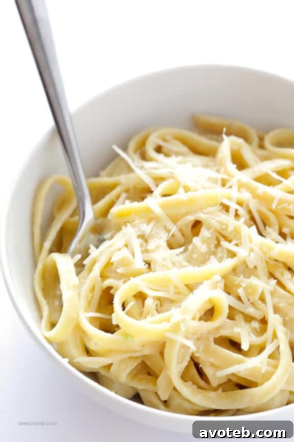 Skinny Fettuccine Alfredo garnished with fresh herbs