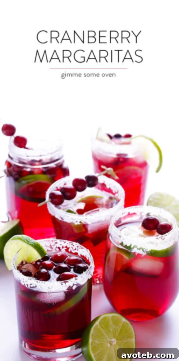 A beautifully presented Cranberry Margarita with a sugared rim, perfect for holiday entertaining.