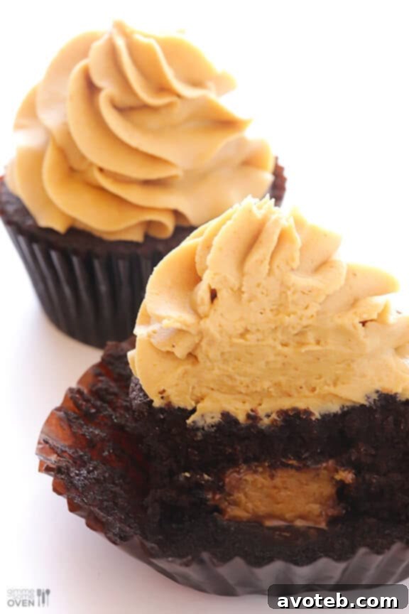 Gooey Reese's Surprise Another close-up of a cupcake, revealing the gooey Reese's inside.