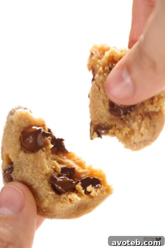 A stack of warm 4-Ingredient Peanut Butter Chocolate Chip Cookies