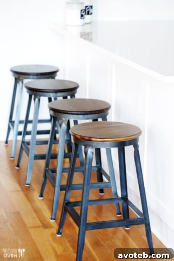 Modern industrial stools at a kitchen island, perfect for entertaining
