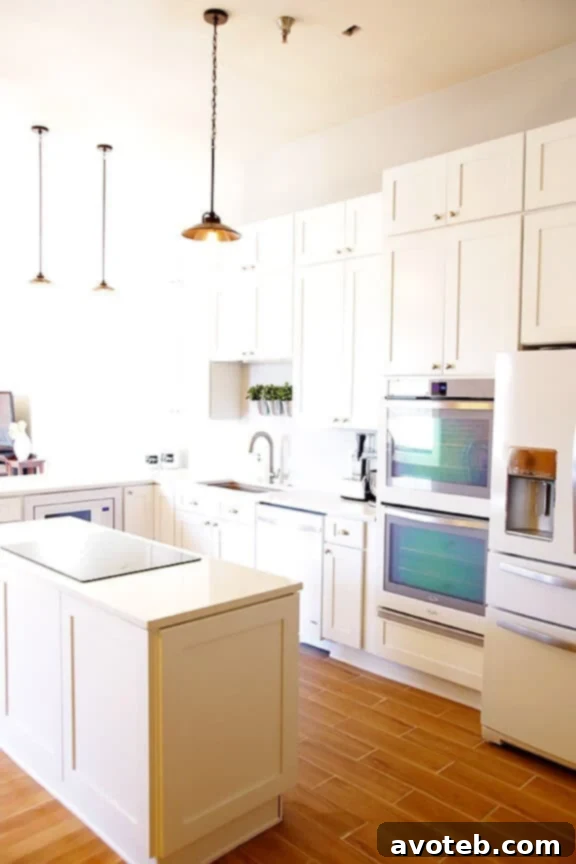 Expansive white kitchen countertops, highlighting ample preparation space