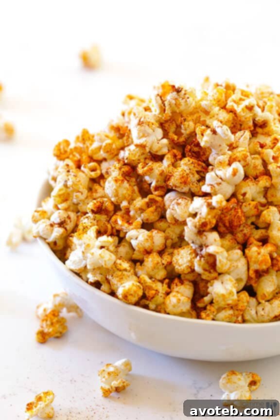 Serving Taco Popcorn Taco Popcorn served in a bowl with a spoon