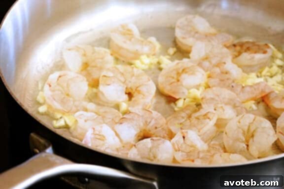 Seasoning Shrimp with Red Pepper Flakes for Zesty Scampi