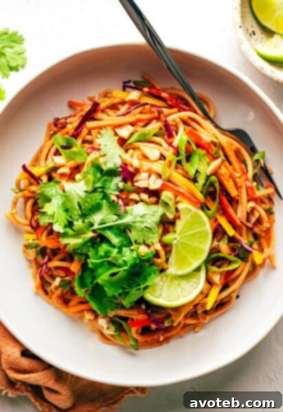 A vibrant bowl of Rainbow Peanut Noodles