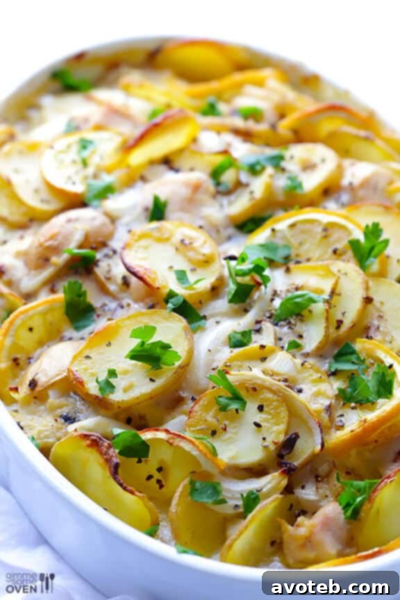 Finished Lemon Chicken Potato Casserole garnished with fresh herbs