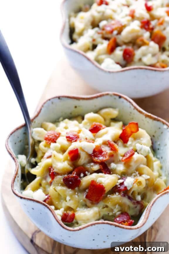 Finished Blue Cheese Bacon Macaroni and Cheese, garnished with extra bacon and blue cheese.
