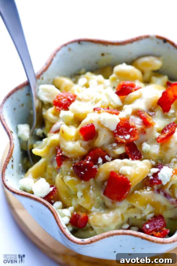 Close-up of a serving of Blue Cheese Bacon Macaroni and Cheese, ready to eat.